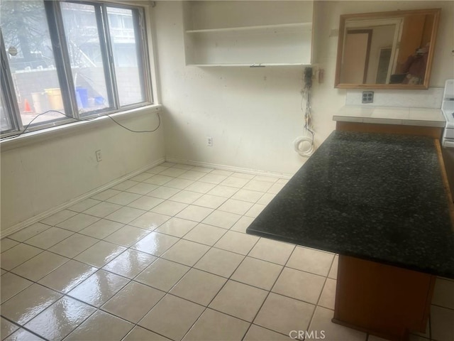 196 Meadow Ln, Crestline, CA 92322 - unfurnished dining area with light tile patterned floors