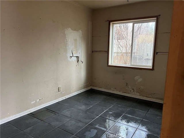 196 Meadow Ln, Crestline, CA 92322 - spare room featuring baseboards and dark tile patterned floors