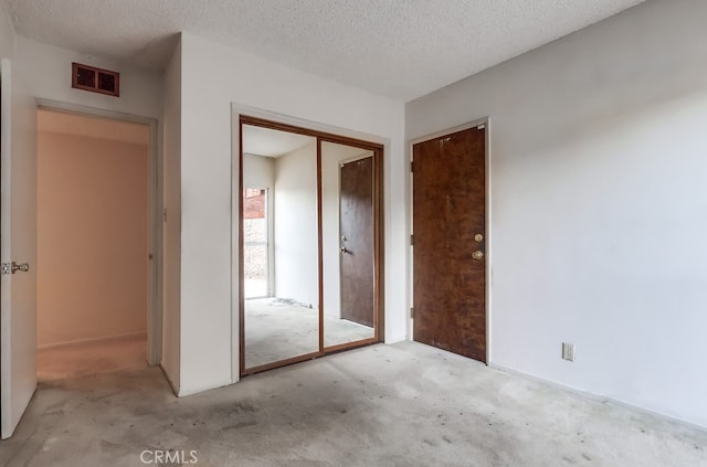 27909 Alaflora Dr, Rancho Palos Verdes, CA 90275 - unfurnished bedroom with a closet, carpet floors, and a textured ceiling