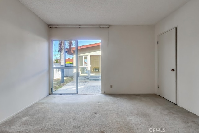 27909 Alaflora Dr, Rancho Palos Verdes, CA 90275 - carpeted empty room featuring a textured ceiling