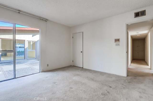 27909 Alaflora Dr, Rancho Palos Verdes, CA 90275 - carpeted empty room featuring a textured ceiling