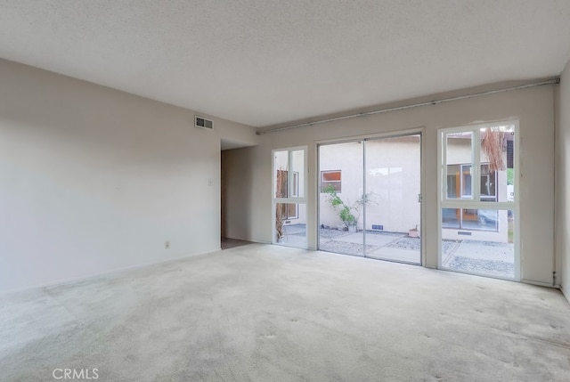 27909 Alaflora Dr, Rancho Palos Verdes, CA 90275 - carpeted spare room with a textured ceiling
