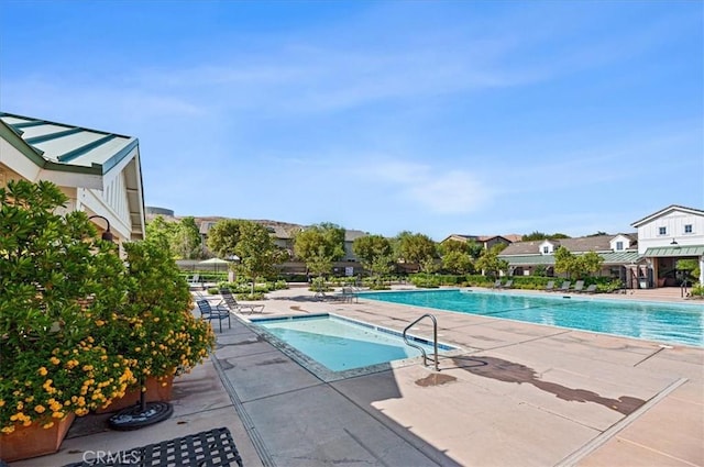 22517 Skipping Stone Dr, Saugus, CA 91350 - community pool featuring a patio area