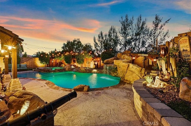 22517 Skipping Stone Dr, Saugus, CA 91350 - view of pool featuring a patio, a fenced backyard, and a pool with connected hot tub