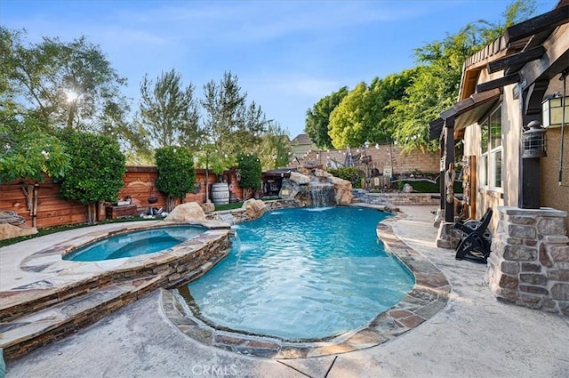 22517 Skipping Stone Dr, Saugus, CA 91350 - view of swimming pool featuring a fenced backyard, a patio, and a pool with connected hot tub
