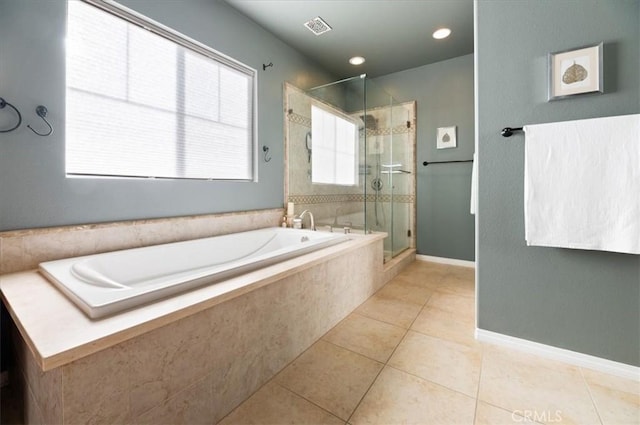 22517 Skipping Stone Dr, Saugus, CA 91350 - full bathroom with a bath, a shower stall, and tile patterned flooring