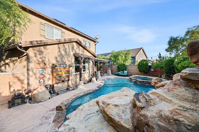 22517 Skipping Stone Dr, Saugus, CA 91350 - view of pool with a fenced backyard, a patio, and a pool with connected hot tub