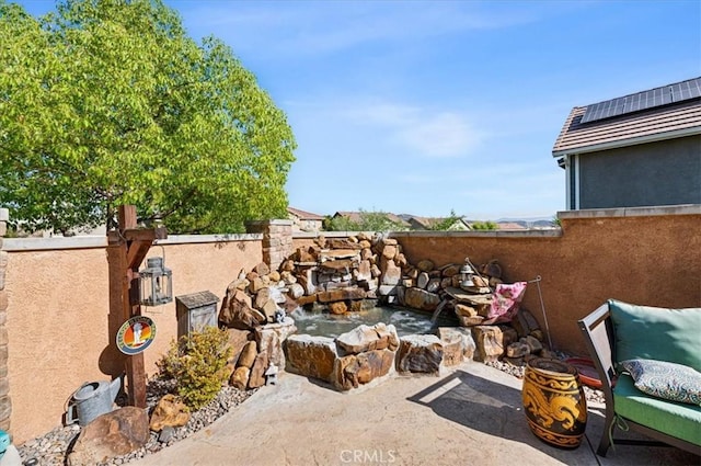 22517 Skipping Stone Dr, Saugus, CA 91350 - view of patio with a small pond