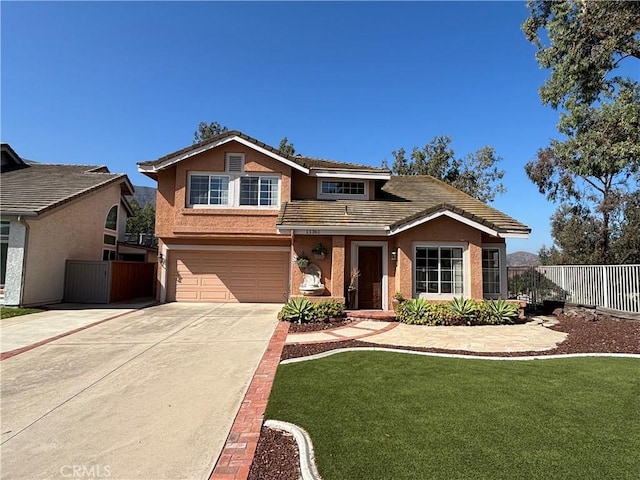 11361 Foxglove Ln, Corona, CA 92878 - traditional-style home with a garage, stucco siding, concrete driveway, and a tile roof