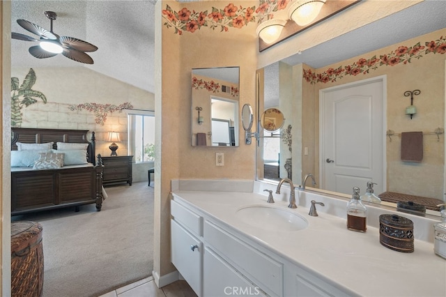 11361 Foxglove Ln, Corona, CA 92878 - bathroom featuring a ceiling fan, lofted ceiling, a textured ceiling, and vanity