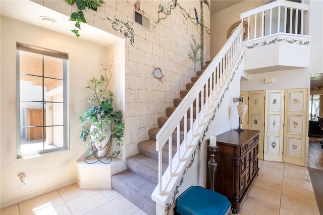 11361 Foxglove Ln, Corona, CA 92878 - stairs with tile patterned floors and healthy amount of natural light