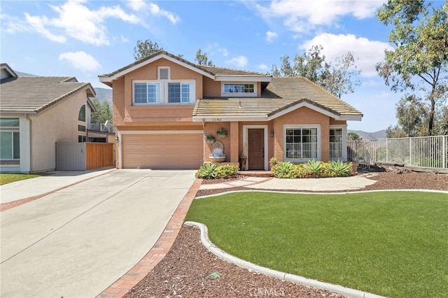 11361 Foxglove Ln, Corona, CA 92878 - traditional-style home with a tiled roof, stucco siding, an attached garage, and concrete driveway