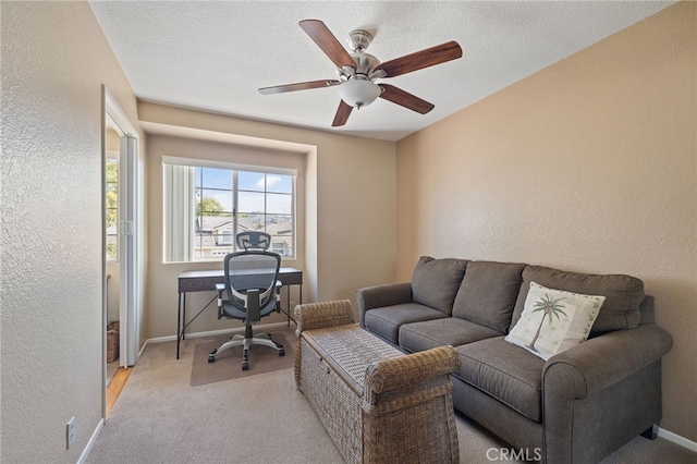 11361 Foxglove Ln, Corona, CA 92878 - office space with ceiling fan, a textured wall, and light carpet