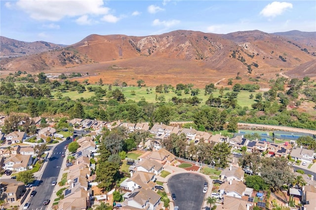 11361 Foxglove Ln, Corona, CA 92878 - aerial overview of property's location with a mountainous background and nearby suburban area