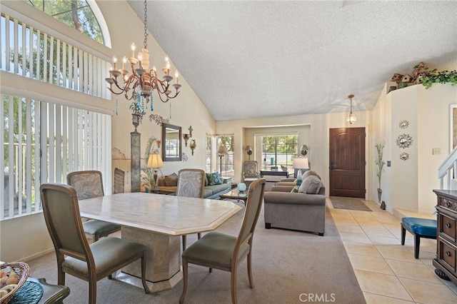 11361 Foxglove Ln, Corona, CA 92878 - dining room with light tile patterned floors, a chandelier, high vaulted ceiling, and a textured ceiling