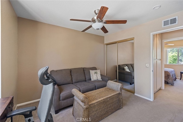 11361 Foxglove Ln, Corona, CA 92878 - living room with ceiling fan and light colored carpet