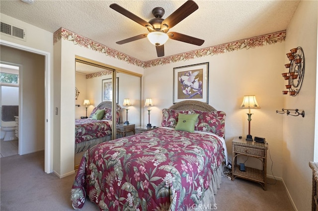 11361 Foxglove Ln, Corona, CA 92878 - bedroom with carpet, a closet, a textured ceiling, and a ceiling fan