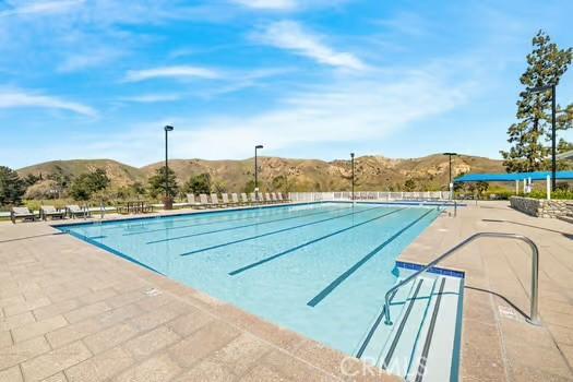 11361 Foxglove Ln, Corona, CA 92878 - community pool with a mountain view and a patio