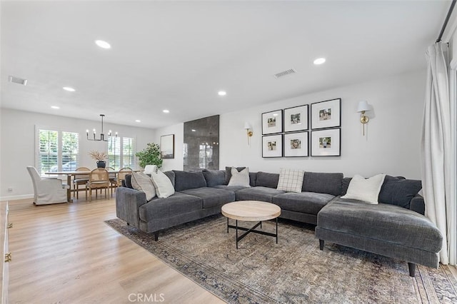 927 E Fairway Dr, Orange, CA 92866 - living area featuring a chandelier, recessed lighting, and light wood-style floors