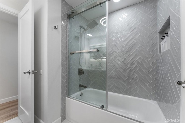 927 E Fairway Dr, Orange, CA 92866 - bathroom featuring combined bath / shower with glass door and wood finished floors