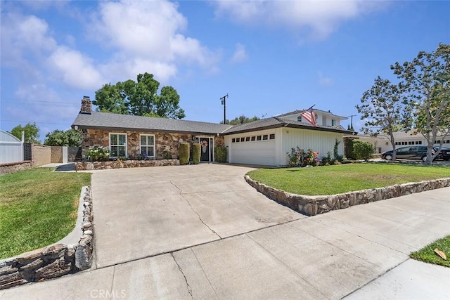 927 E Fairway Dr, Orange, CA 92866 - ranch-style home with an attached garage, concrete driveway, a chimney, a front lawn, and stone siding