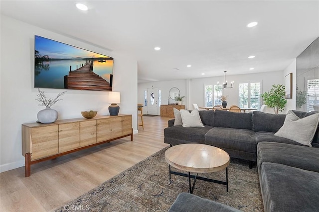 927 E Fairway Dr, Orange, CA 92866 - living area with wood finished floors, recessed lighting, and a chandelier