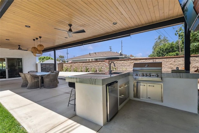 927 E Fairway Dr, Orange, CA 92866 - view of patio featuring exterior kitchen and a ceiling fan