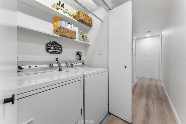 927 E Fairway Dr, Orange, CA 92866 - laundry room featuring light wood-type flooring and separate washer and dryer