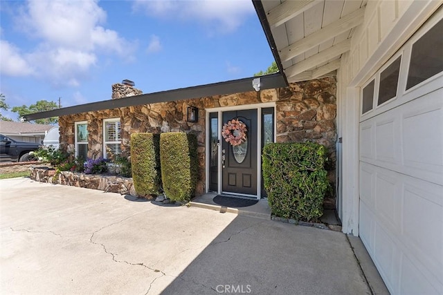 927 E Fairway Dr, Orange, CA 92866 - property entrance with stone siding and a chimney