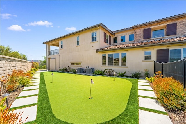 16389 Viewcrest Rd, Chino Hills, CA 91709 - back of house with a putting area, stucco siding, and a tiled roof