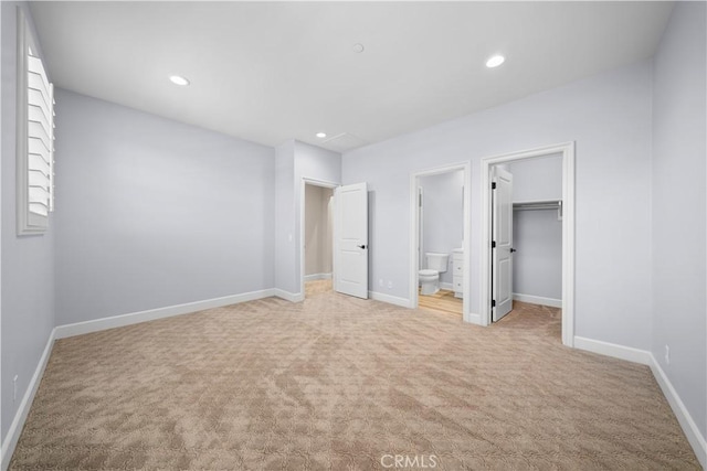 16389 Viewcrest Rd, Chino Hills, CA 91709 - unfurnished bedroom featuring light colored carpet, recessed lighting, a spacious closet, ensuite bath, and a closet