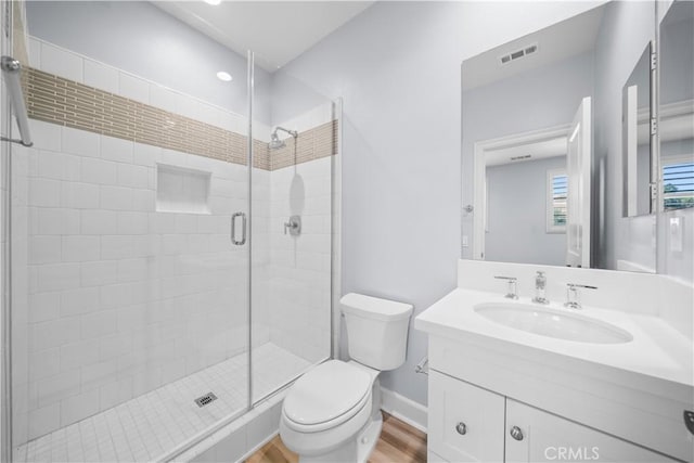 16389 Viewcrest Rd, Chino Hills, CA 91709 - full bathroom featuring vanity, a shower stall, and wood finished floors