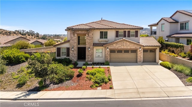 16389 Viewcrest Rd, Chino Hills, CA 91709 - view of front of house with a tiled roof, an attached garage, driveway, and stucco siding