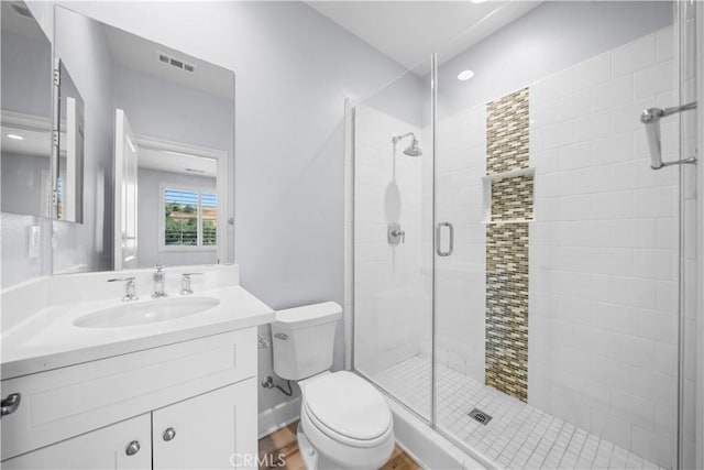16389 Viewcrest Rd, Chino Hills, CA 91709 - full bathroom featuring vanity, a shower stall, and wood finished floors