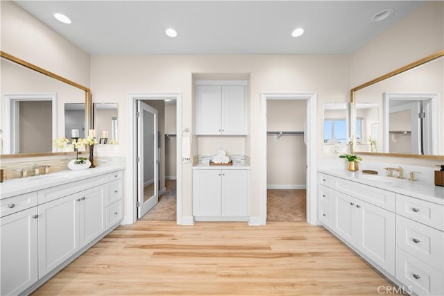 16389 Viewcrest Rd, Chino Hills, CA 91709 - full bath with two vanities, wood finished floors, and a spacious closet