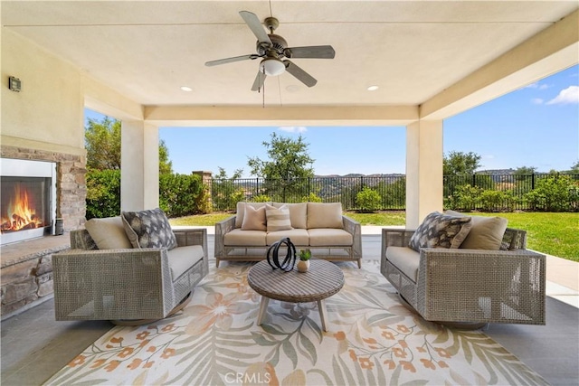 16389 Viewcrest Rd, Chino Hills, CA 91709 - fenced backyard featuring an outdoor living space with a fireplace, a patio, and ceiling fan