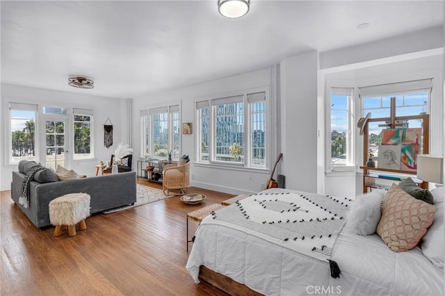 360 W Ocean Blvd Unit 402, Long Beach, CA 90802 - bedroom featuring wood finished floors and baseboards