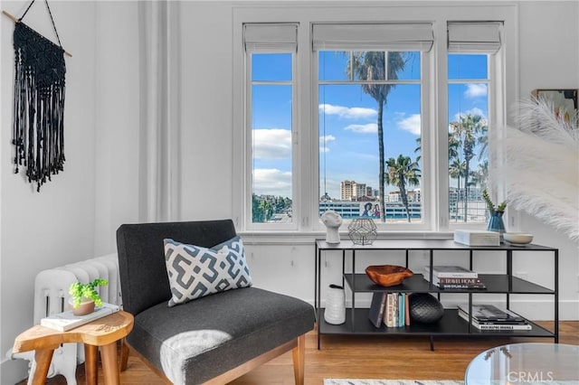 360 W Ocean Blvd Unit 402, Long Beach, CA 90802 - living area featuring plenty of natural light and wood finished floors