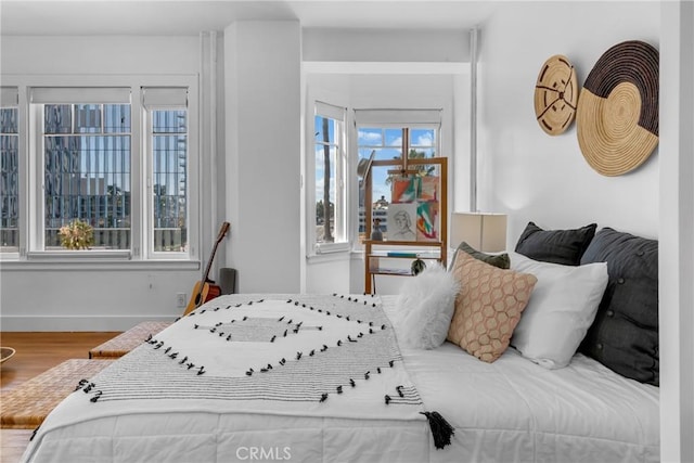360 W Ocean Blvd Unit 402, Long Beach, CA 90802 - bedroom featuring wood finished floors and baseboards