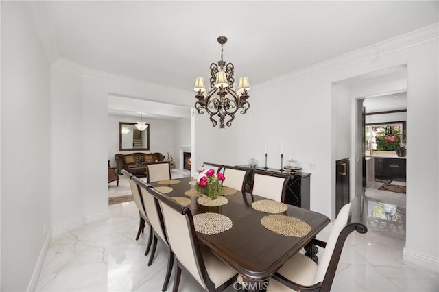 5231 Flora Ct, Rancho Cucamonga, CA 91739 - dining space featuring light marble finish flooring, a chandelier, crown molding, and a warm lit fireplace