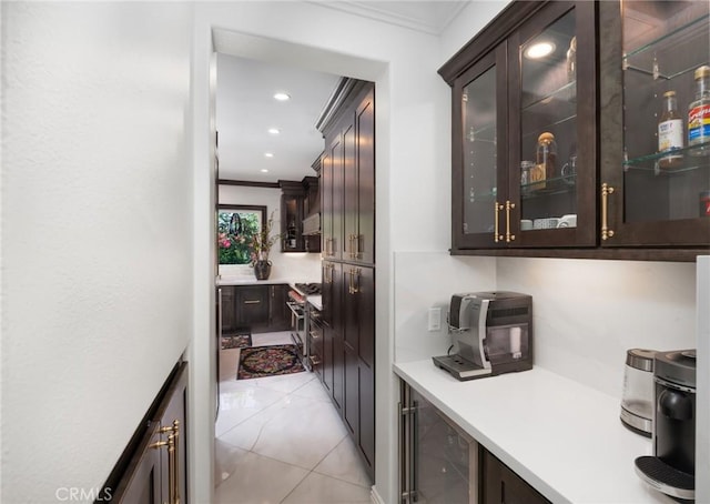 5231 Flora Ct, Rancho Cucamonga, CA 91739 - bar area featuring beverage cooler, ornamental molding, and recessed lighting