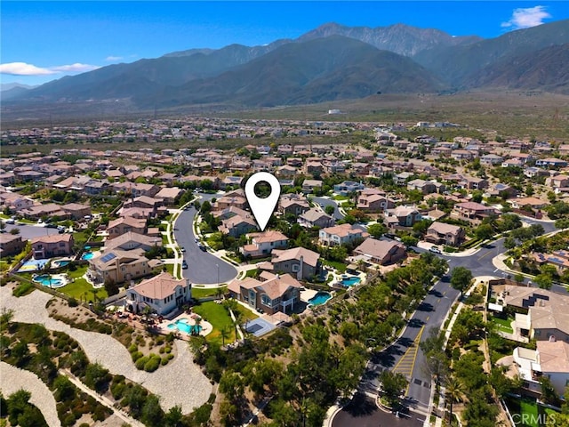 5231 Flora Ct, Rancho Cucamonga, CA 91739 - aerial overview of property's location with nearby suburban area