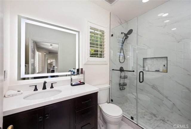 5231 Flora Ct, Rancho Cucamonga, CA 91739 - bathroom with a marble finish shower, vanity, and recessed lighting