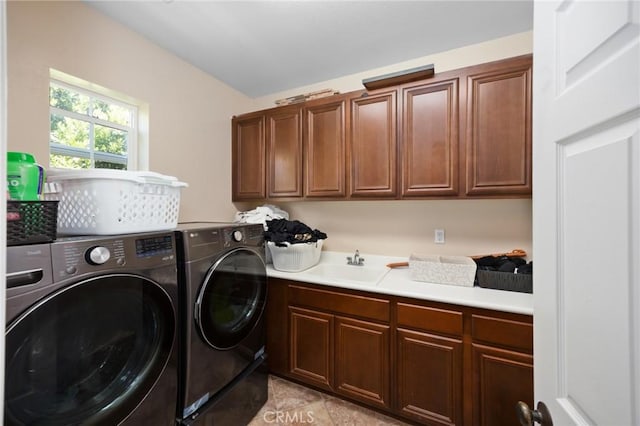 5231 Flora Ct, Rancho Cucamonga, CA 91739 - washroom with washer and dryer, cabinet space, and light tile patterned flooring