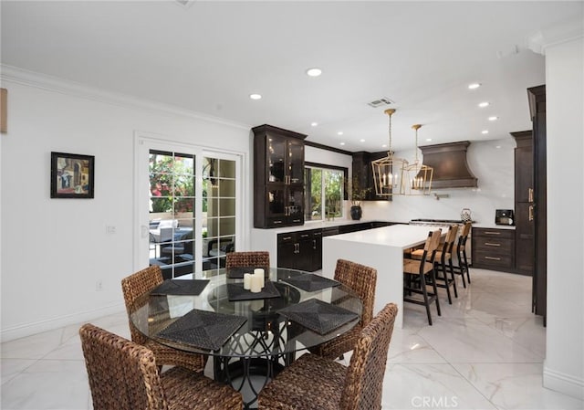 5231 Flora Ct, Rancho Cucamonga, CA 91739 - dining room featuring light marble finish flooring, a chandelier, ornamental molding, and recessed lighting