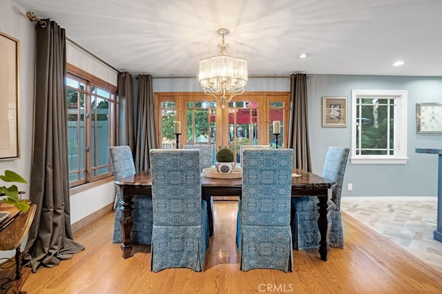 24630 Kittridge St, West Hills, CA 91307 - dining space featuring a chandelier, wood finished floors, french doors, and recessed lighting