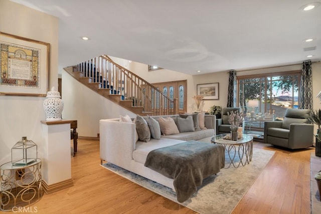 24630 Kittridge St, West Hills, CA 91307 - living room featuring stairs, wood finished floors, and recessed lighting