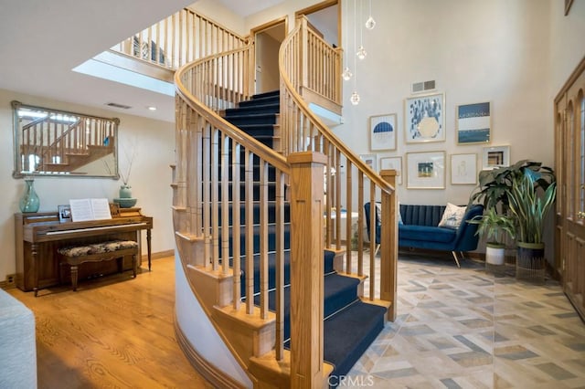 24630 Kittridge St, West Hills, CA 91307 - stairway with a high ceiling and wood finished floors