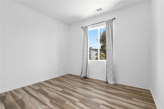 403 Aura Dr, Costa Mesa, CA 92626 - empty room with wood finished floors