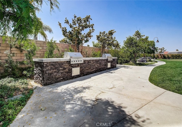 403 Aura Dr, Costa Mesa, CA 92626 - view of patio featuring exterior kitchen